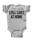 Still Lives at Home Onesie