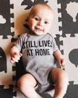 Still Lives at Home Onesie
