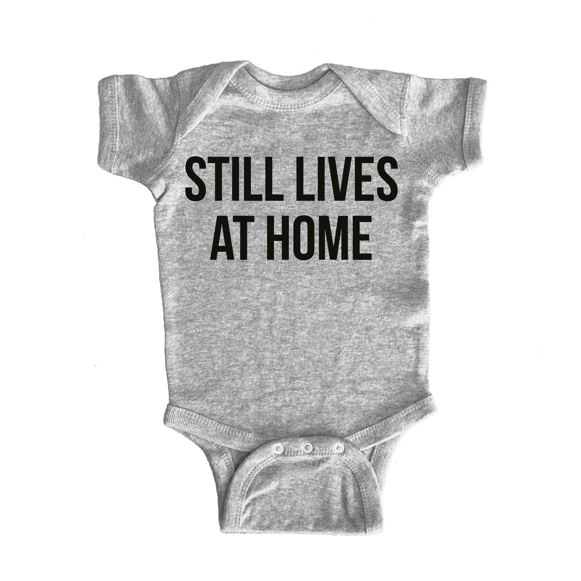 Still Lives at Home Onesie